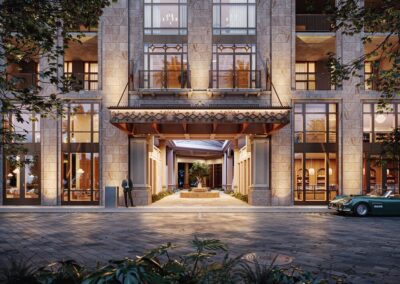 Elegant building entrance with greenery.